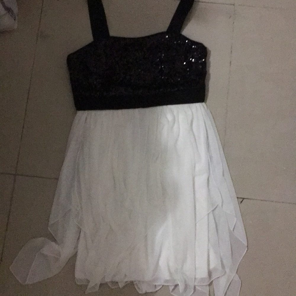 This is a girls formal white and black dress